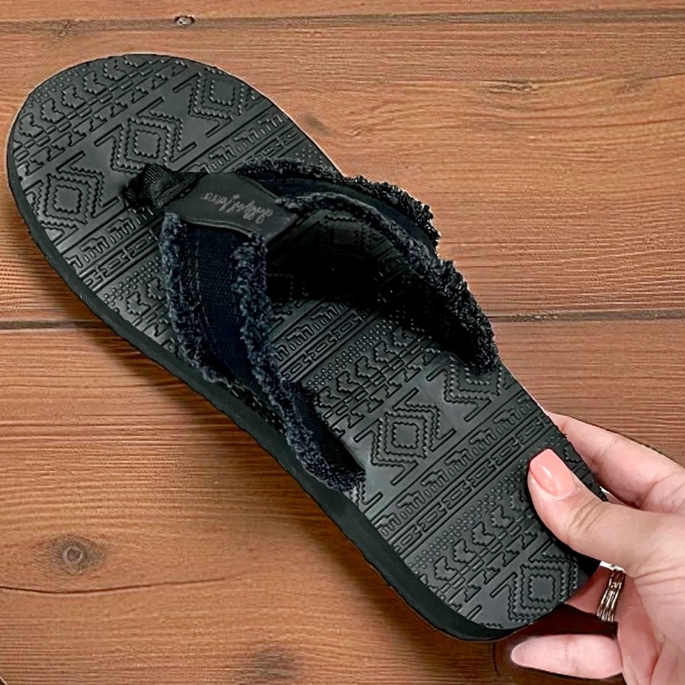 Black Patterned Flip Flops